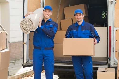 Removal van service loading furniture into a vehicle