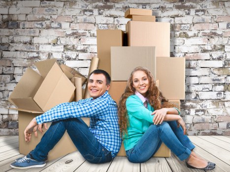 Removal team preparing household items for a move in Kentish Town