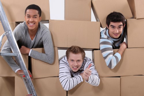 Staff using PPE and safe handling during a removal van job