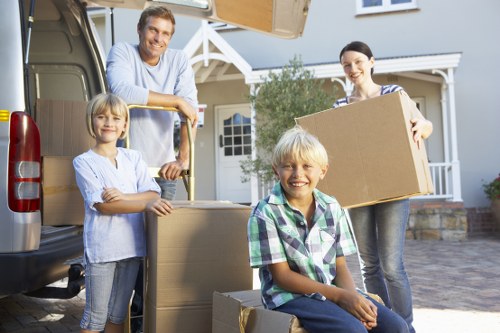 Local removals team handling student belongings in a Kentish Town flat
